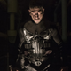 Jon Bernthal as the Punisher, backlit by shadow and staring someone down.